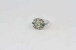 18WG deco style tablet ring. Bezel set central diamond with 2 emerald baguettes. Est 1ct (1.01)