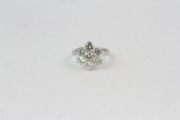 18WG Claw set 7 stone cluster ring marked 750 18K TDW 2.92ct size M