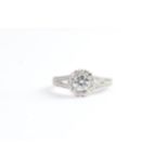 0.53ct Diamond Cluster Ring, centre diamond estimated 0.53ct, mounted with diamond surround and