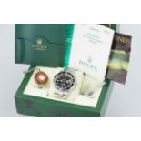 ROLEX OYSTER PERPETUAL DATE SUBMARINER W/ BOX & GUARANTEE REF. 16610 CIRCA 2004, circular black dial