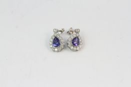 18WG Tanzanite and diamond cluster drop earrings, pear shaped. TZ 3.10 D1.60