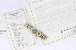 STEEL AND GOLD LADIES CHOPARD GSTAAD WITH DIAMOND BEZEL WITH PAPERS