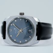 *TO BE SOLD WITHOUT RESERVE* GENTLEMAN'S CRONEL BLUE DIAL REVERSE CYCLOPS, MANUAL EB 8800, CIRCA.