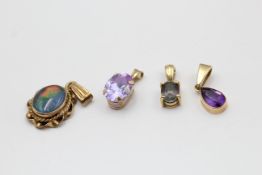 4 x 9ct gold gemstone pendants inc. opal, amethyst, mystic topaz (4.3g)