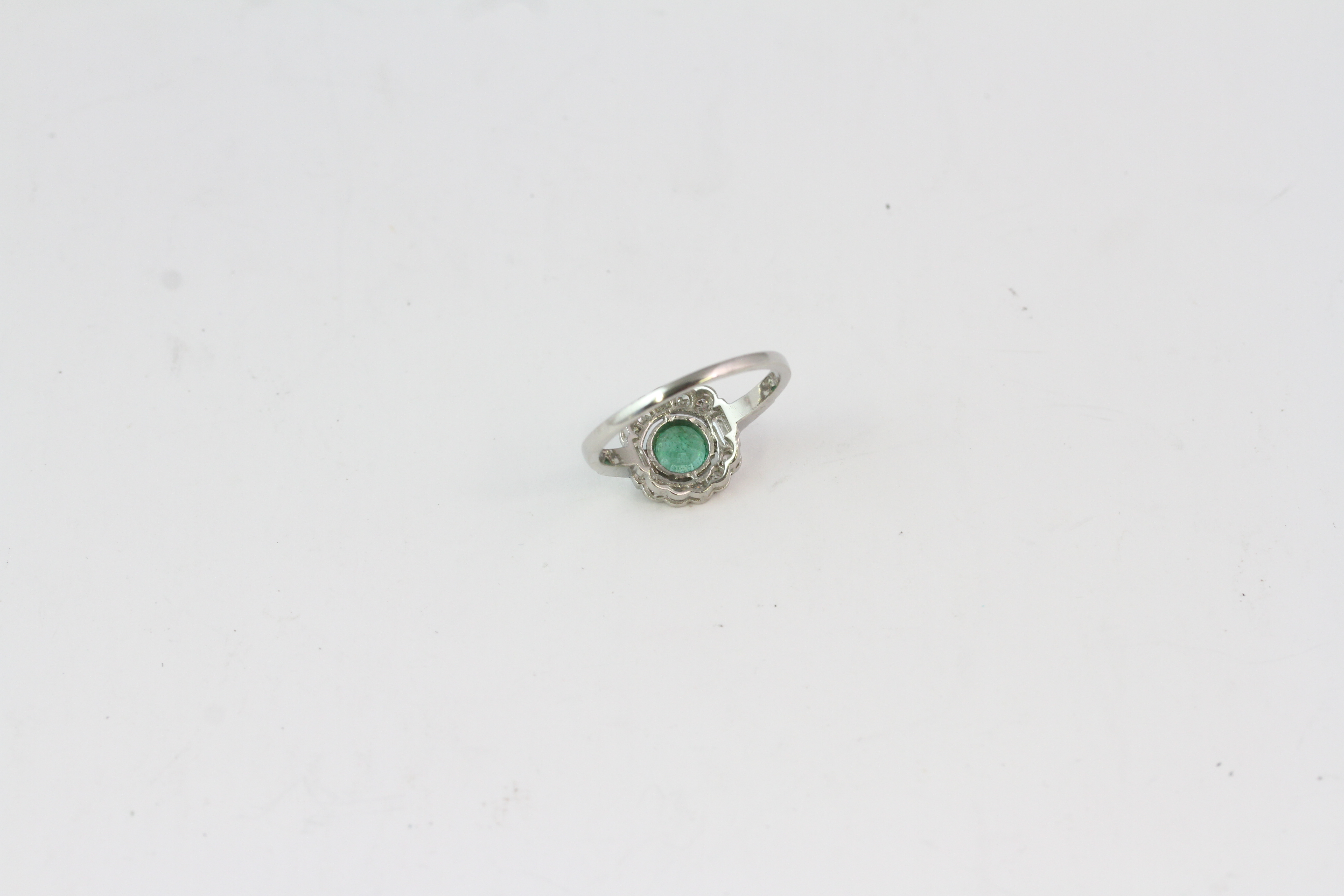 Platinum Round emerald and diamond cluster ring with baguettes E0.70 D0.25 - Image 2 of 2