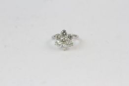 18WG Claw set 7 stone cluster ring marked 750 18K TDW 2.92ct size M