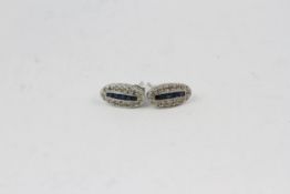 18WG Vintage oval shaped earrings with a central row of sapphires