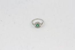 Platinum Round emerald and diamond cluster ring with baguettes E0.70 D0.25