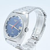 LONGINES LARGE ULTRONIC DATE TONNEAU WRISTWATCH WITH ELECTRIC BLUE DIAL MODEL 8479 IN STAINLESS