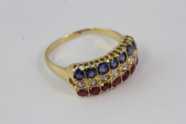 18 carat yellow gold a ‘Tricolour’ tablet ring with rows of sapphire, ruby and diamond.
