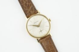 GARRARD 9CT GOLD WRISTWATCH, circular silver dial with stick hour markers and hands, 32mm 9ct gold