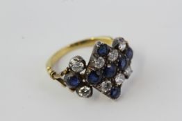 In 18 carat yellow gold a Victorian sapphire and diamond handmade shaped ring with alternating rows