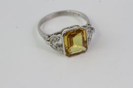 In platinum a yellow sapphire