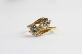 1.60ct Brilliant cut diamond double twist ring, two brilliant cut diamonds, estimated 0.80ct each,