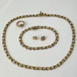 Fine two coloured Italian 9ct gold suite of jewellery . Marked Italy 9kt . Set in white and yellow
