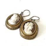 Antique pair of gold Etruscan carved cameo earrings. Set in gold Etruscan frames with natural carved