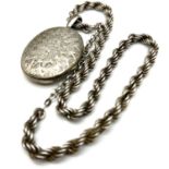 Antique silver engraved locket and heavy rope twist collar necklace. The locket measures 6.5cm x 3.