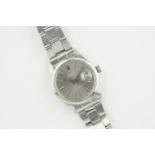 ROLEX OYSTER PERPETUAL DATE GREY DIAL REF. 1500 CIRCA 1970, circular grey sunburst dial with white