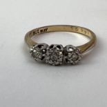 Vintage 9ct gold and platinum diamond three stone ring. Marked 9ct PLAT . Uk size R. Weighs 2.8
