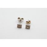 18ct white gold diamond stud earrings (weighs 0.7g ) measures 5mm x 5mm wide . Marked 750 by the