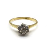 Fine 18ct gold diamond cluster ring. The head of the ring measures 6mm wide. Uk size M. Total weight