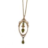 Antique Edwardian 9CT gold peridot and seed pearl necklace. Marked 9CT. The pendant measures 5.7