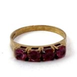 Fine 9ct gold and ruby four stone ring. Fully hallmarked for 9ct gold. Uk size p 1/2 . Total