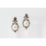 Silverset on gold freshwater pearl and rose cut diamond earrings D0.80. stamped 750