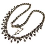 Antique garnet fringe Riverie necklace. Set with natural garnets . Measureâ€™s 40cm in length by 1.