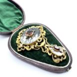 Antique gold and moss agate articulated brooch in fitted leatherette box. Set in gold with moss