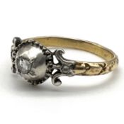 Antique Georgian high carat gold rose cut diamond ring. The diamond is set in silver with a high