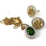 Fine 9ct gold green diopside necklace and earrings suite. The earrings measure 1cm wide. Marked