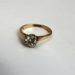 Fine 18ct gold and platinum 61 point brilliant cut solitaire diamond ring. Marked 18ct PLAT and .