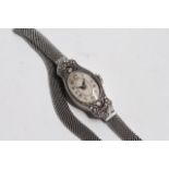 VINTAGE PLATINUM DIAMOND CASE LADIES WATCH