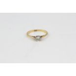 Antique 18 CT gold 40 point diamond solitaire ring. Marked 18 CT. Set with a solitaire diamond