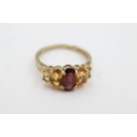 9ct gold citrine and garnet ring - weighs 3.2 g. Set with natural Garnet and citrine stones .