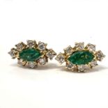 Fine 18ct gold emerald and diamond earrings. Measure 1.5cm x 0,9cm wide. Total weight 3.4 grams. Set