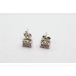 9ct gold 12 point diamond stud earrings - weighs 1.2 grams . Set with brilliant cut diamonds.