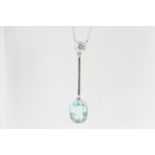 In white gold an aquamarine and diamond pendulum pendant fixed on a chain. Marked 750. Aquamarine