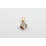 9ct gold 25 point diamond geometric pendant - weighs 0.7 grams. Set with multiple princess cut