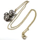 Fine 9ct gold and sterling silver rose diamond spider necklace. The pendant is set in silver with