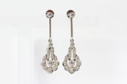 White gold long drop diamond earrings with circular backs. No weights known. Full hallmark 1991 with