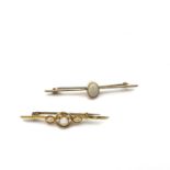 Antique 9CT gold pair of Opal bar brooches. Both are set with natural firey opals. Marked 9CT for
