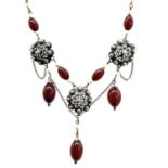 Antique silver and cherry Amber necklace. Set with cherry amber beads alternating with faux