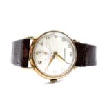Vintage 9ct gold Garrards gentlemans wrist watch . In good working order. Set in a 9ct gold case.