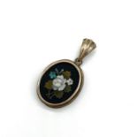Antique 9CT gold pietra dura locket pendant. Set with a floral Pietra dura front and a hinged