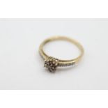 9ct gold cinnamon diamond floral cluster set ring weighs 1.8 grams . Set with white and cinnamon