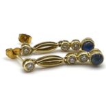 Fine 18ct gold sapphire and diamond earrings . Set with cabochon sapphire and brilliant cut