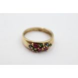 9ct gold emerald, ruby & sapphire band ring weighs 3.1 grams . Fully hallmarked for 9ct gold. Uk