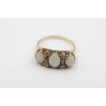 9ct gold natural opal & diamond gypsy set ring weighs 4.1 grams. Set with three fiery opals and 6